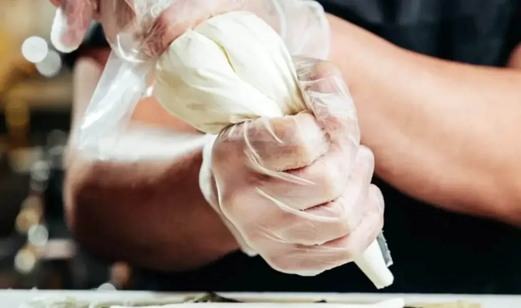 person putting whip cream