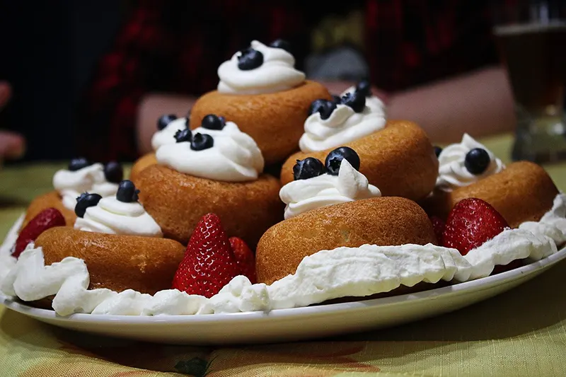 whipped cream pastries on plate
